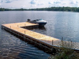 A boat parked at an L-shaped Pipe Dock.